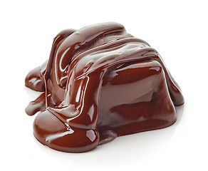 Image showing piece of chocolate covered with melted chocolate