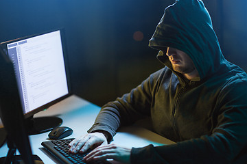 Image showing hacker using computer virus for cyber attack