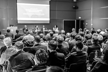 Image showing Business speaker giving a talk at business conference event.