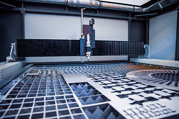 Image showing CNC Laser cutting of metal, modern industrial technology.