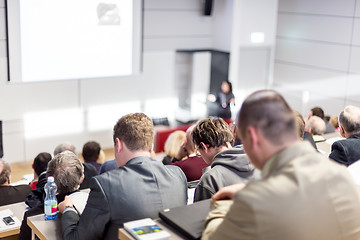 Image showing Business speaker giving a talk at business conference event.