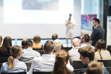 Image showing Business speaker giving a talk at business conference event.