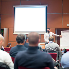 Image showing Speaker Giving a Talk at Business Meeting.