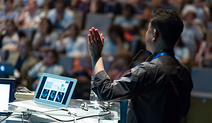 Image showing Public speaker giving talk at Business Event.