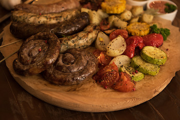 Image showing Grilled sausage with vegetables