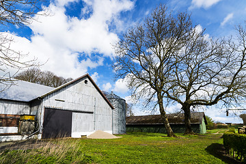 Image showing Rural barnyard with a silo