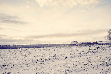 Image showing Small farm house in a rural scenery with sunrise