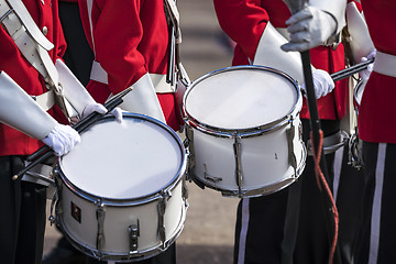 Image showing Soldiers in red uniforms with drums