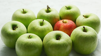 Image showing Green apples with red in heap