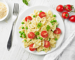 Image showing plate of pasta with cheese and vegetables