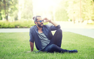 Image showing man in sunglasses at city street or park