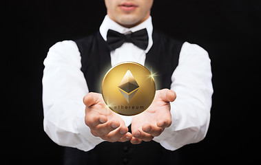 Image showing close up of magician with ethereum coin