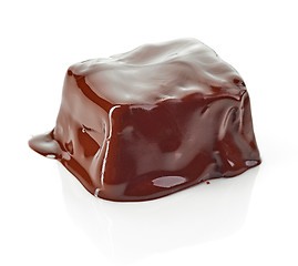 Image showing piece of chocolate covered with melted chocolate