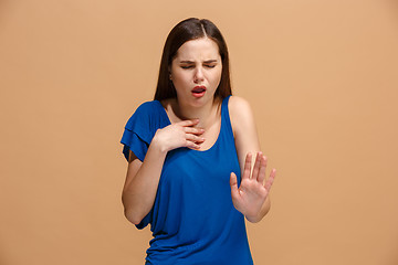 Image showing Disgust woman with thoughtful expression making choice against pastel background