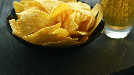 Image showing Plate with nachos and beer 