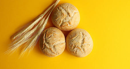 Image showing Golden buns of bread and wheat