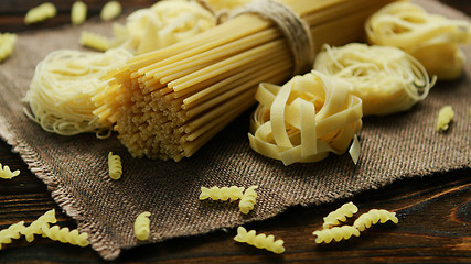 Image showing Spaghetti of different kind on napkin