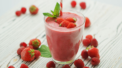 Image showing Strawberry smoothie in glass with mint