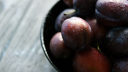 Image showing Closeup of wet fresh plums
