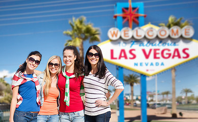 Image showing young women over welcome to las vegas sign