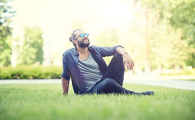 Image showing man in sunglasses at city street or park