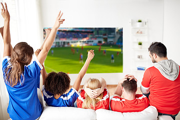 Image showing happy friends or football fans watching soccer