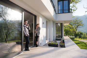 Image showing couple enjoying on the door of their luxury home villa