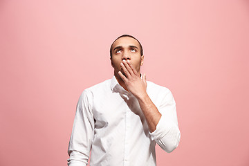 Image showing Beautiful bored man bored isolated on pink background