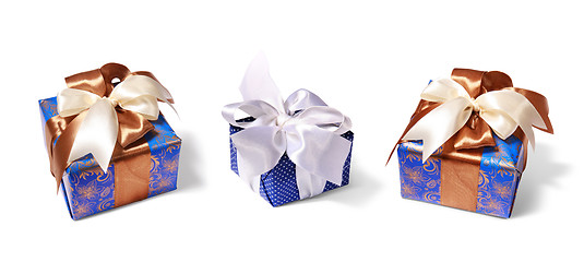 Image showing gifts packing tied by ribbon
