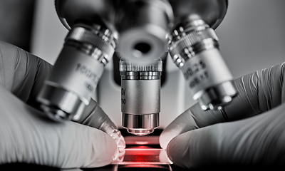 Image showing Scientist hands with microscope