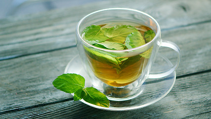 Image showing Cup of tea with mint