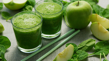 Image showing Green smoothie in glasses and ingredients