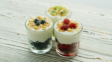 Image showing Cups with berries and cream