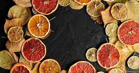 Image showing Dried slices of citrus fruit and leave