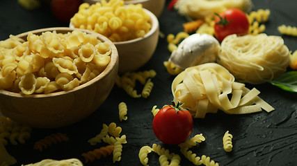 Image showing Bowls full of macaroni and tomatoes