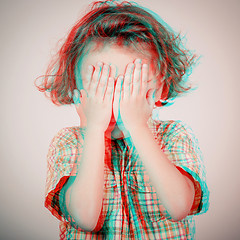 Image showing Portrait of sad little boy standing near wall