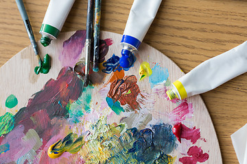 Image showing acrylic color or paint tubes and palette
