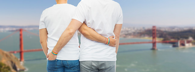 Image showing male couple with gay pride rainbow wristbands