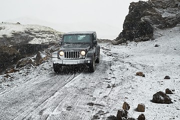 Image showing Jeep Wrangler on Icelandic terrain with snow