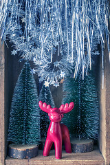 Image showing some Christmas decoration in an old wooden box