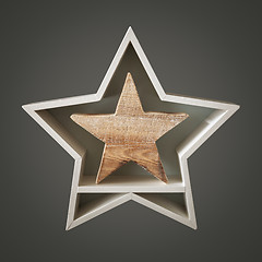 Image showing Christmas decoration white star with wooden star inside