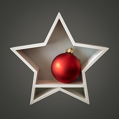 Image showing Christmas decoration white star with red glass ball inside