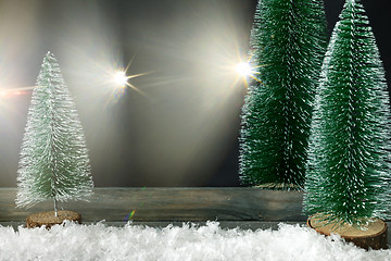 Image showing Christmas decoration background with fir trees and light flares