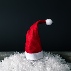 Image showing red Santa Claus hat with black background