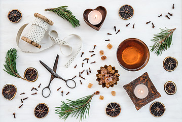 Image showing Christmas decor with candles, teacup and vintage items