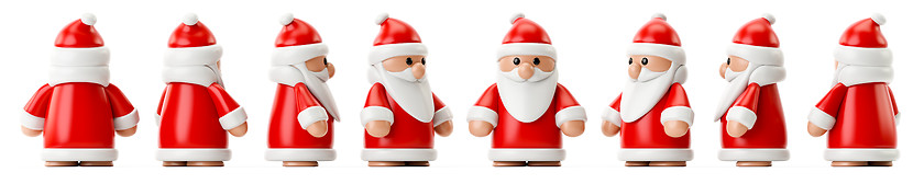 Image showing row of Santa Claus figures