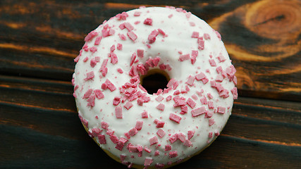 Image showing Glazed doughnut with pink sprinkles