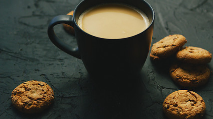 Image showing Mug of cocoa and cookies
