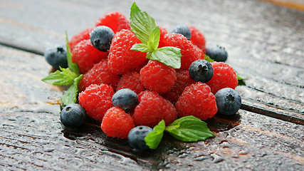 Image showing Raspberry and blueberry on table 