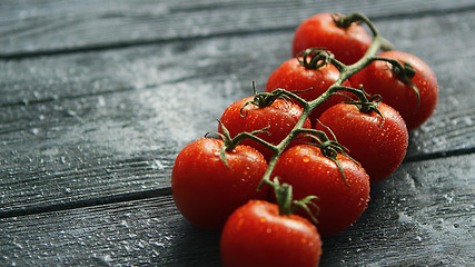 Image showing Branch with cherry tomatoes 